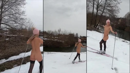 Nackte Skifahrerin, solo, mit Tattoos