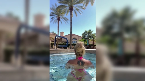 milf swedish bella showing off her big tits in the pool