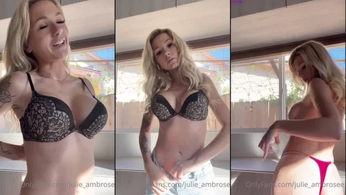 Blondine Julie Ambrose zieht sich obenrum aus