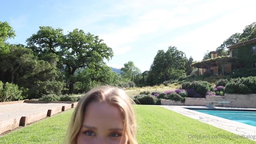 Caroline Zalog Trying On Clothes Outdoors