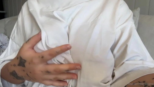 MLK plays with her big beautiful tits