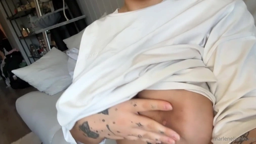 MLK plays with her big beautiful tits