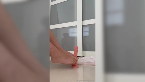 Jasi Jordan Giving Super Hot Footjob on Dildo
