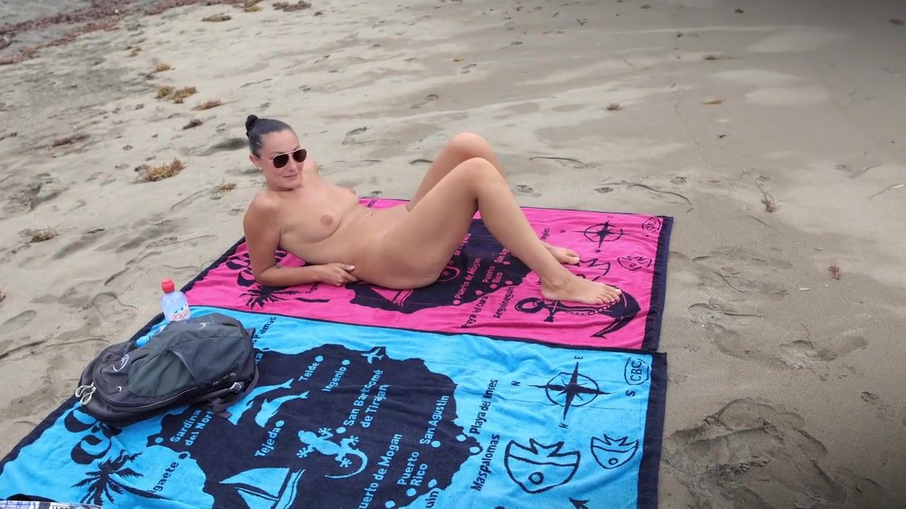 TASHA SINZ gives a Random Stranger a Handjob at the Nudist Beach