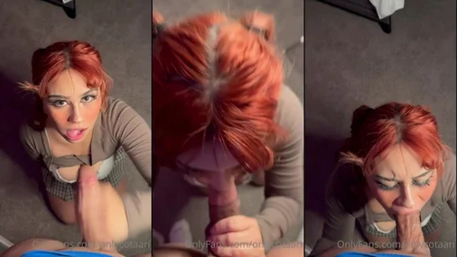 Onlycotaari – Rothaarige gibt voll bekleidet einen Blowjob
