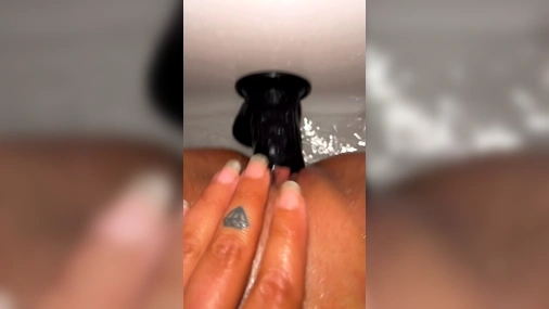 Swedish Mamachulo dildo in the bathtub