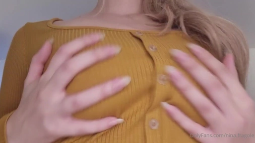 Swedish Nina Fragole oiling up her tits