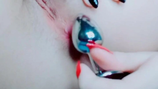 Littleatgirl Inserts Anal Plug Close Up