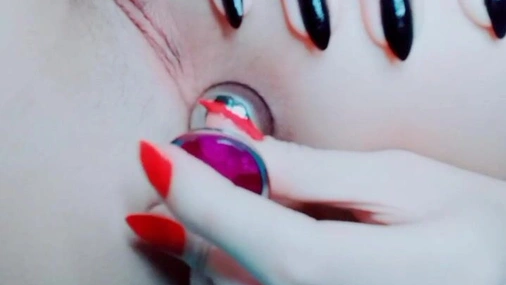 Littleatgirl Inserts Anal Plug Close Up
