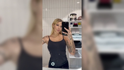 Swedish Josefin Ottosson Flashing Big Tits in Mirror