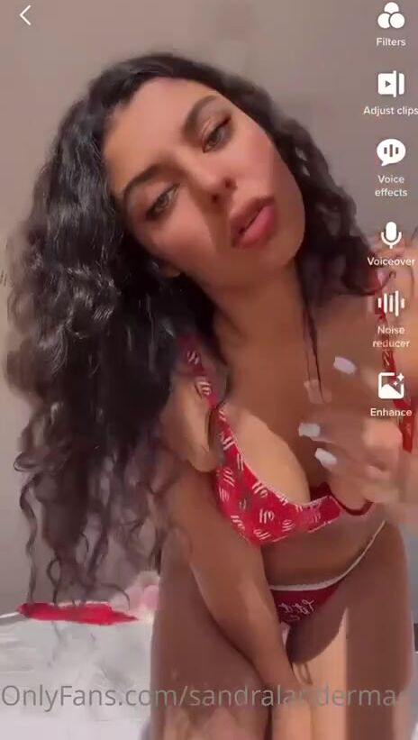 Danish Sandra Stripping and oiling up her body