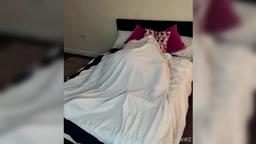 lesbian couple in bed making love