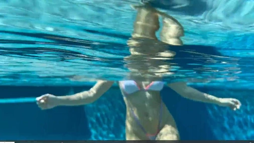Christina Khalil  Bikini Teasing in Pool